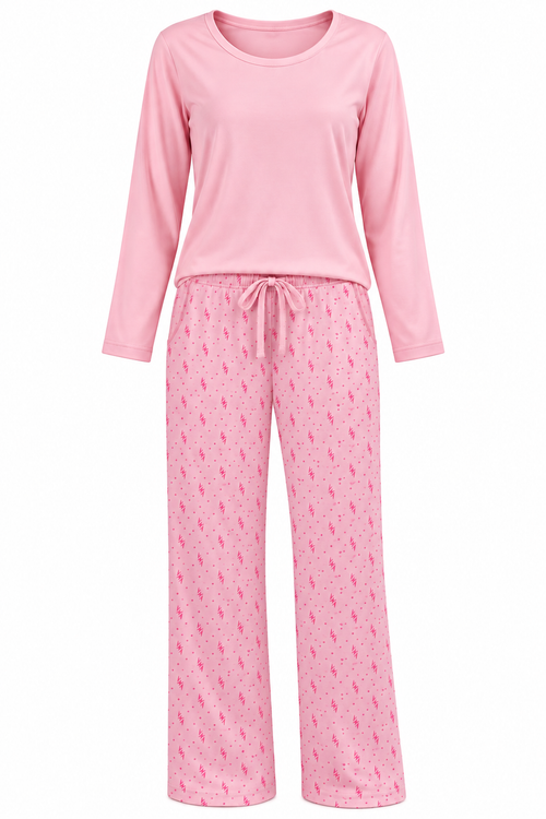 Pink women’s stretch-knit pajama set — solid long-sleeve top and zigzag-and-dot printed trousers, front view